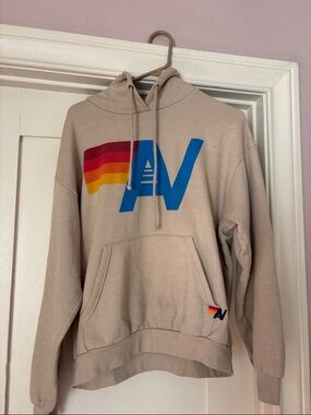 Aviator Nation Beige Hoodie with Blue AV and Retro Stripe SOLD OUT